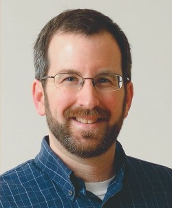 Photo of Dr. Josh Vura-Weis, Associate Professor of Chemistry, and Associate Head of Major Projects